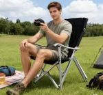 ⁦Heavy-Duty High-Back Folding Camping Chair - Oversized Black Lounge Chair with Steel Frame⁩ - الصورة ⁦3⁩